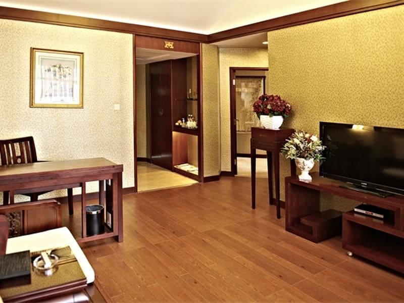 Grand One Bedroom King Suite at The Venetian Las Vegas with a private bedroom and elegant dining area